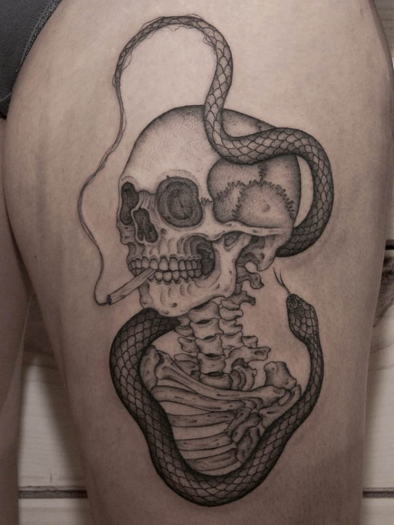 tatuaje anatomico de una calavera con linea fina
